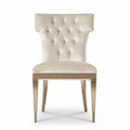 Tufted velvet dining chair with gold accents and modern design 45 x 45 x 90cm